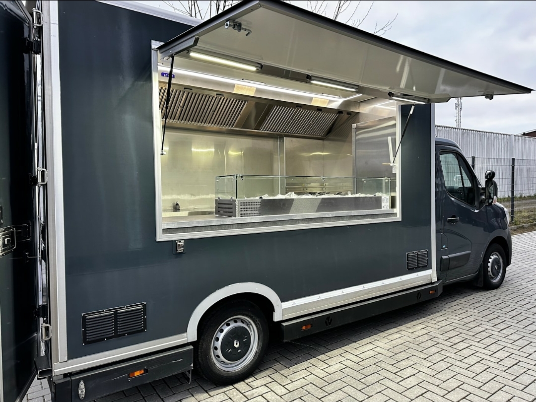 Renault Master food truck with 3 fryers – side view with open serving hatch